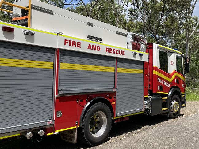 A Queensland Fire Department truck parked at Rogar Avenue in North Rockhampton where ambulance paramedics have gained access to the First Turkey mountain bike trails to reach an injured rider.