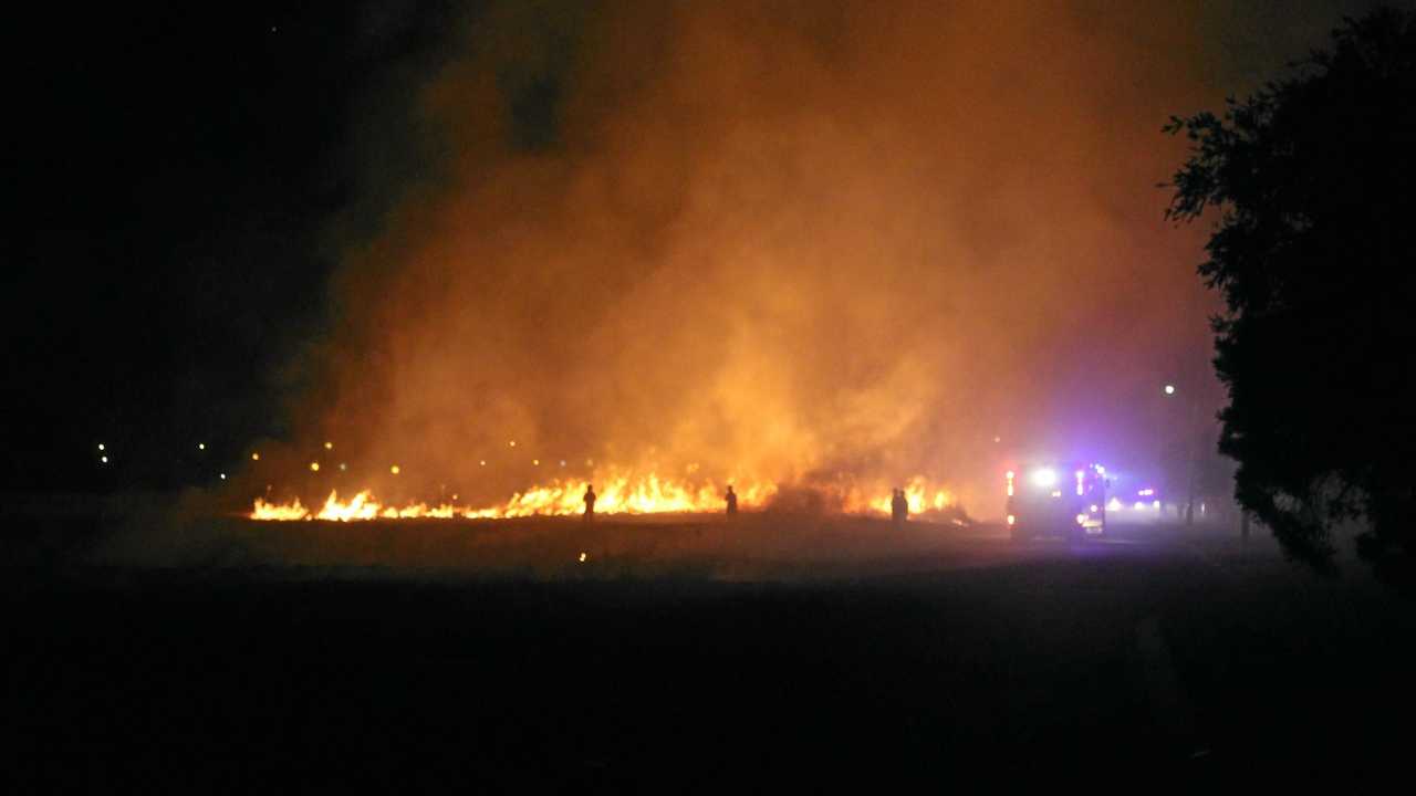 LIT UP: Kingaroy firefighters tackle the blaze on Kelvyn St on the second night, Saturday August 4 at 11pm. Picture: Robert Postlethwaite