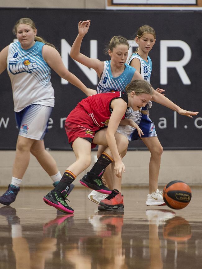 Gosford City Rebels player Charlotte Rittie under pressure from Central Coast Waves player Ella Morgan during the under-14 women’s basketball playoff. Picture: Troy Snook