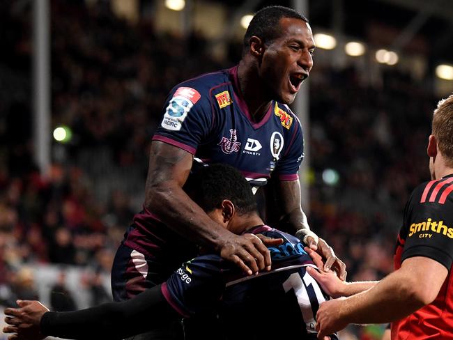 CHRISTCHURCH, NEW ZEALAND - JUNE 03: Suliasi Vunivalu of the Reds celebrates with Filipo Daugunu of the Reds after his try during the Super Rugby Pacific Quarter Final match between the Crusaders and the Queensland Reds at Orangetheory Stadium on June 03, 2022 in Christchurch, New Zealand. (Photo by Joe Allison/Getty Images)