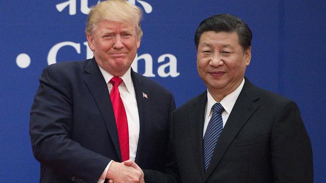 Donald Trump and Chinese President Xi Jinping in Beijing in 2017. Picture: AFP