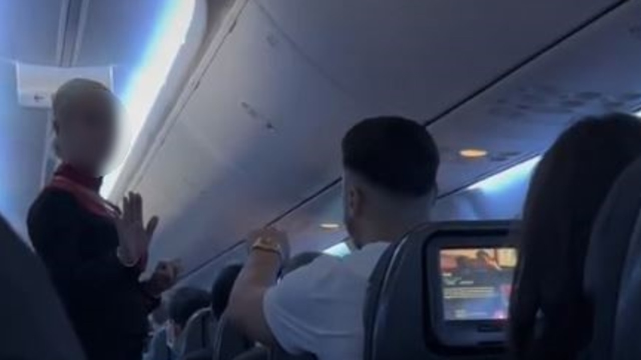 The flight attendant repeatedly asked the man to: “Stop”. Picture: TikTok.