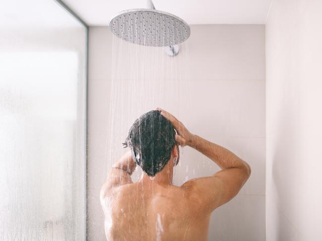 Man taking a shower generic