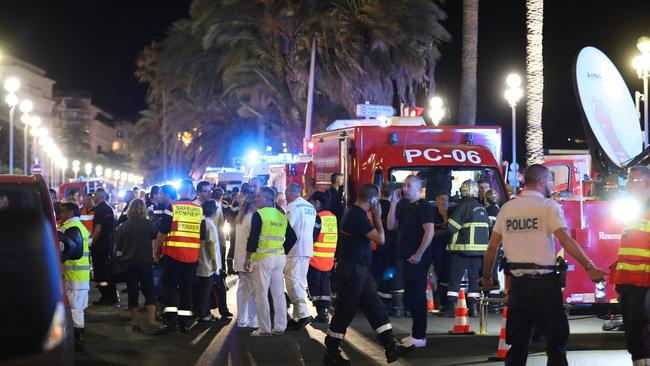 Rescue workers at the scene. <i>AFP PHOTO / Valery HACHE</i>