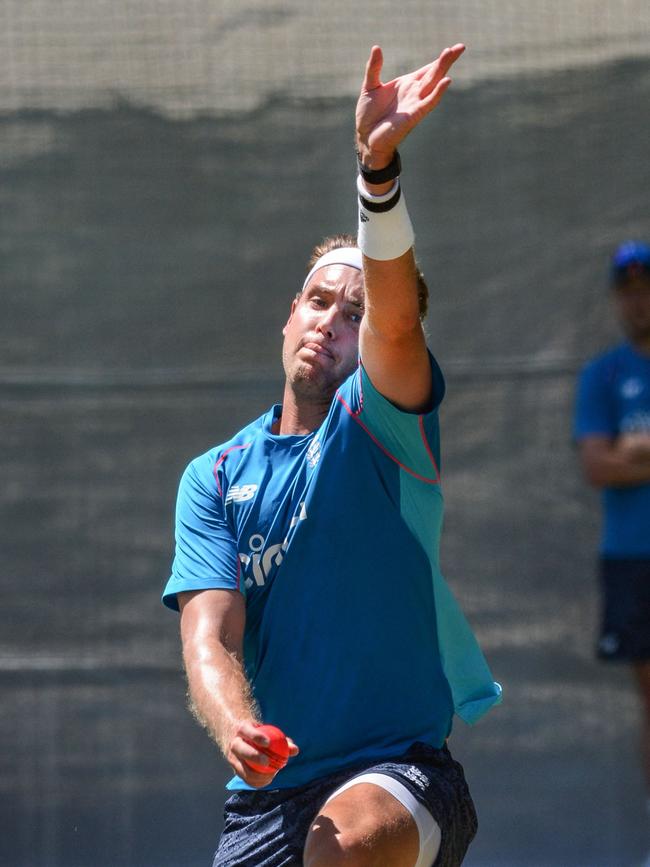 Stuart Broad tests out the pink ball. Picture: AFP