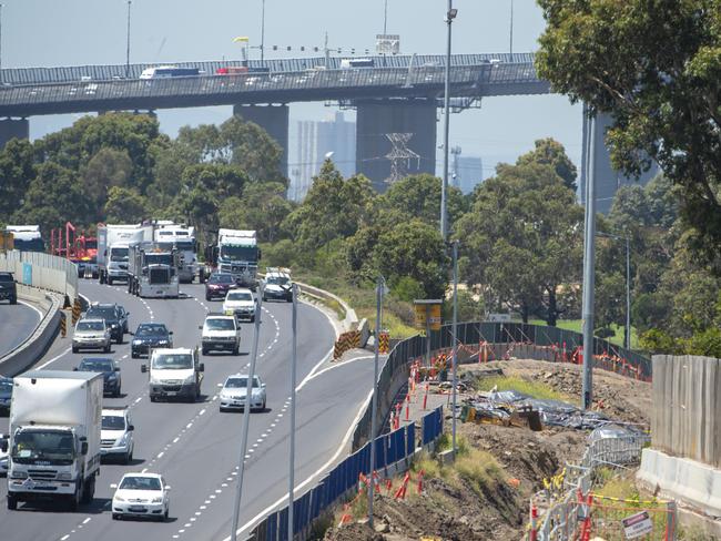 A mound of soil- covered in black tarp behind the barricades running along the Westgate Freeway, Williamstown Road on- ramp heading outbound.Picture Jay Town