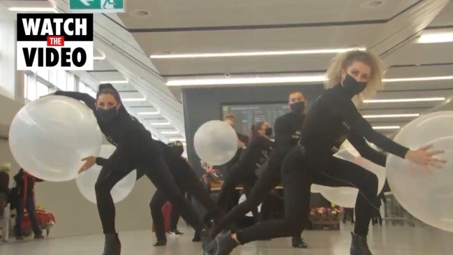 Bizarre bubble dance at Melbourne airport (ABC News)