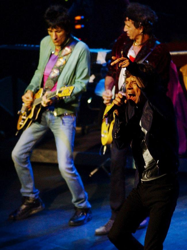 Sydney, February 18, 2003. (lt-rt) Ronnie Woods, Keith Richards and Mick Jagger of the Rolling Stones during their performance at the 2000 seater Enmore Theatre in Newtown as part of their 2003 Licks World Tour. (AAP Image/Dean Lewins) NO ARCHIVING