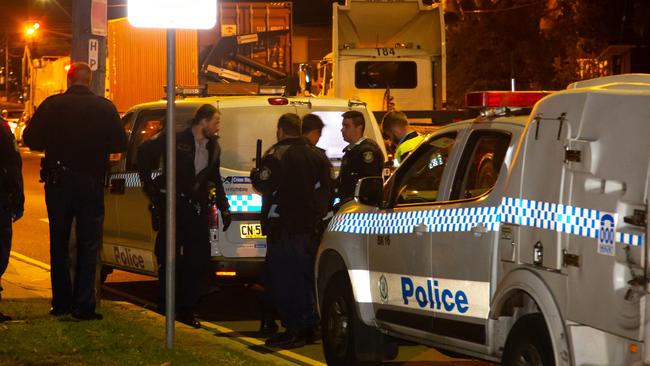 Police at the scene of the accident last night. Picture: Damian Hofman.