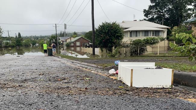 Receding flood water reveals damage in Hunter Street, Lismore, on March 1, 2022.