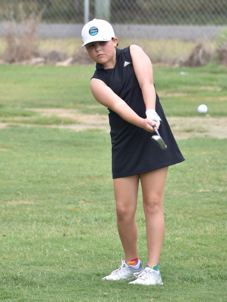 Rockhampton's Lexie Curtis (girls nine to 10 years) chips onto the green at the US Kids Golf Foundation Australian Open at the Rockhampton Golf Club on September 28.