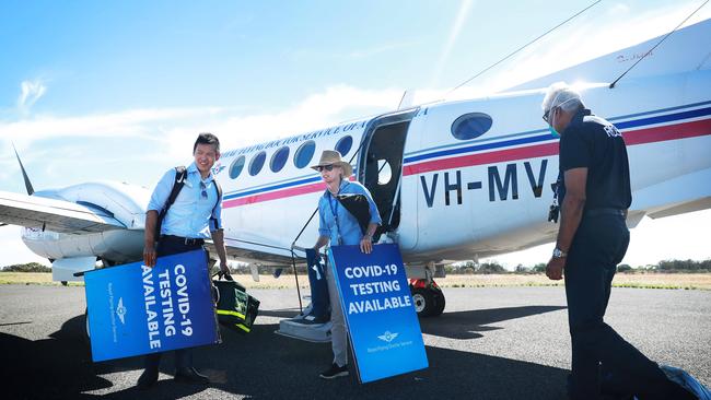 Dr Caroline West, middle, arrives in Ivanhoe in western NSW with medical student William Zhou, left, and fellow doctor Prem Suvado. Picture: John Feder