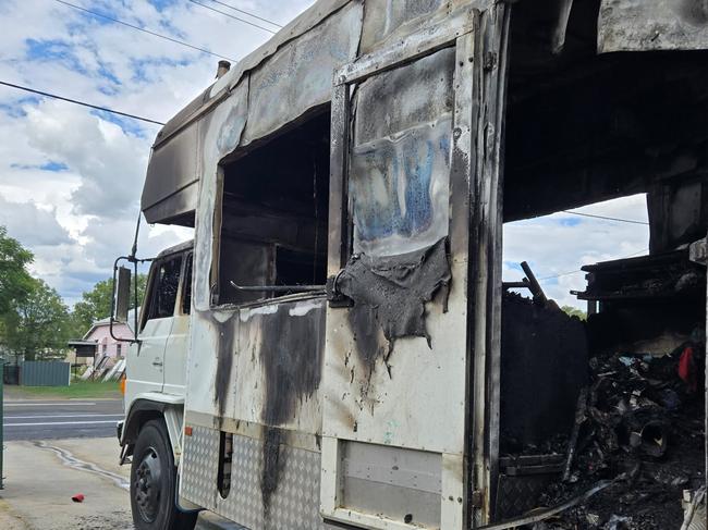 The burn-out shell of the mobile home belonging to Queensland country jockeys Sarah Robbins and Brendon Newport.