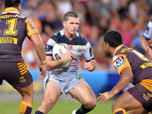 Lachlan Coote looks to take on the Broncos defence.