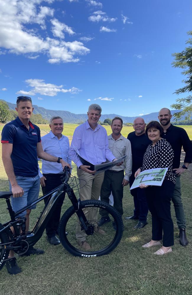 Corry Cycles owner Evan Corry, Mackay Tourism CEO Al Grundy, Tourism Minister Stirling Hinchliffe, developer Michael Harris, architect Barry Lee, Mackay MP Julieanne Gilbert, and landscape architect Thomas Schubel at the future site of Pioneer Valley Outdoor Tourist Hub in Finch Hatton. Photo: Zoe Devenport