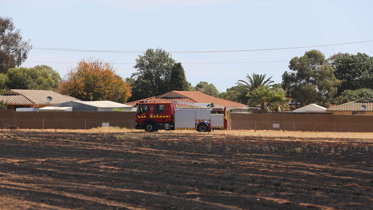 Scenes from the Smithfield grass fire that burnt in a direction towards Boddington Street, Donnington Street and Konanda Road. Picture: Emma Brasier