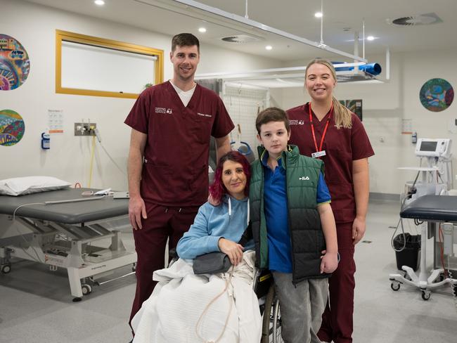 Samantha Hall and her son Oliver Butterworth, pictured with members of the Royal Hobart Hospital trauma team, Rohan Lynham and Sarah Sproule. Picture: Marina Hacquin