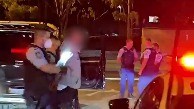 NSW Police Force branded vision of the arrest of a 37-year-old man at Huntingwood and a 43-year-old man at Mascot Police Station, the men were arrested over 2009 murder of Omega Ruston – Photo NSW Police
