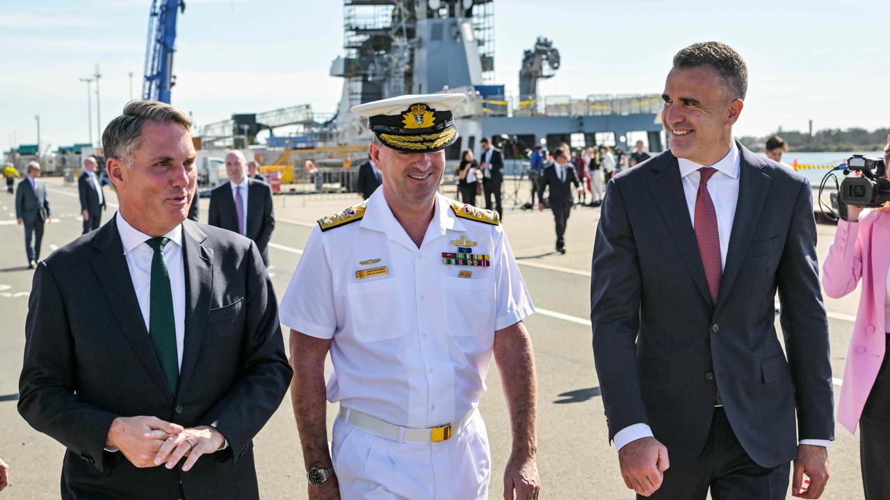 Defence Minister Richard Marles, Nuclear Powered Submarine Task Force chief Vice Admiral Jonathan Mead and SA Premier Peter Malinauskas at the Osborne Naval Shipyard. Picture: NCA NewsWire / Brenton Edwards