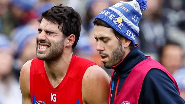 MELBOURNE, AUSTRALIA - JUNE 10: Christian Petracca of the Demons leaves the field injured during the 2024 AFL Round 13 match between the Collingwood Magpies and the Melbourne Demons at The Melbourne Cricket Ground on June 10, 2024 in Melbourne, Australia. (Photo by Dylan Burns/AFL Photos via Getty Images)