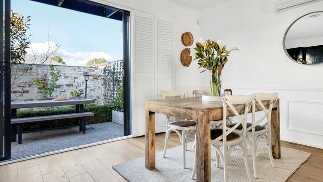 The dining area opens out to an entertainer’s courtyard.