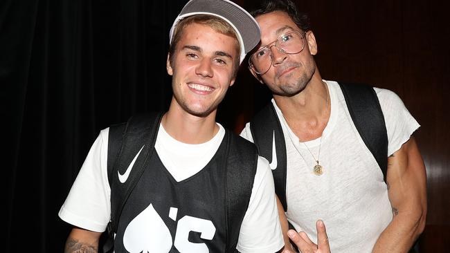 Justin Bieber and Carl Lentz at a basketball game. Picture: Getty Images