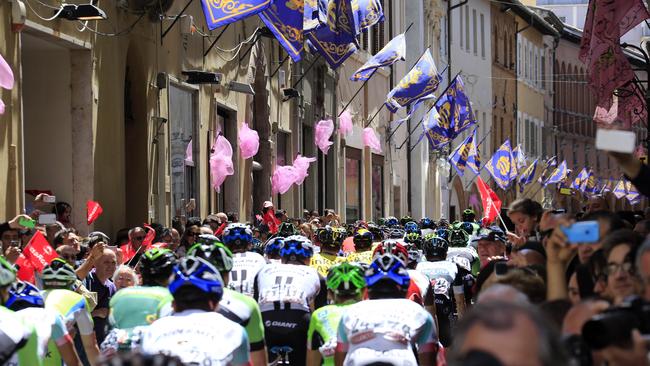 Riders take the start of the eighth stage from Foligno to Montecopiolo. Picture: AFP