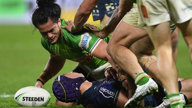 SUNSHINE COAST, AUSTRALIA - AUGUST 12: Jahrome Hughes  of the Storm suffers a concussion after a tackle during the round 22 NRL match between the Melbourne Storm and the Canberra Raiders at Sunshine Coast Stadium, on August 12, 2021, in Sunshine Coast, Australia. (Photo by Albert Perez/Getty Images)