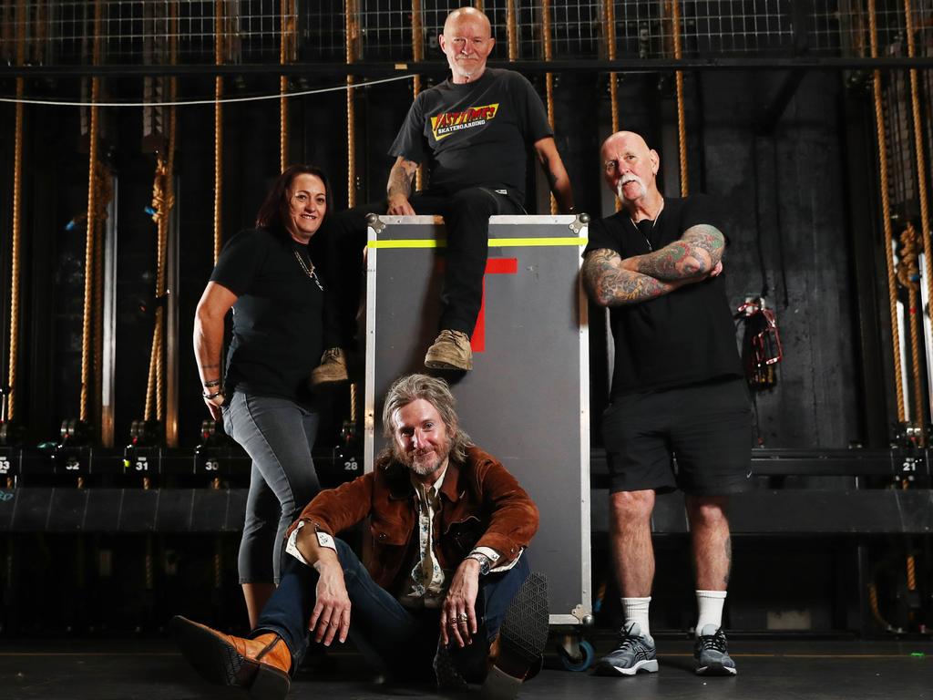 Musician Tim Rogers with roadies Kath Millar, John Barker and Howard Freeman. Picture: Aaron Francis