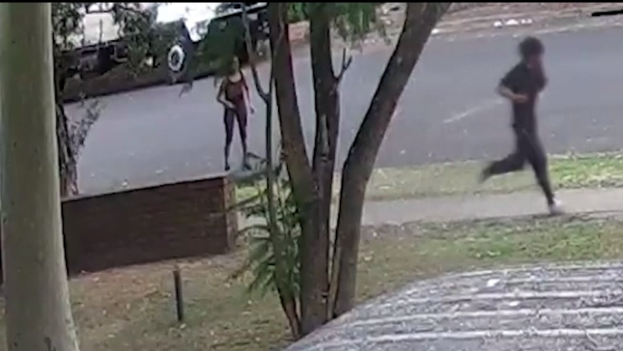 He is then seen running away from the scene, leaving the woman standing in shock. Picture: NSW Police