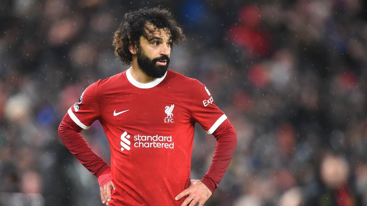 TOPSHOT – Liverpool's Egyptian striker #11 Mohamed Salah looks on during the English Premier League football match between Liverpool and Newcastle United at Anfield in Liverpool, north west England on January 1, 2024. (Photo by PETER POWELL / AFP) / RESTRICTED TO EDITORIAL USE. No use with unauthorised audio, video, data, fixture lists, club/league logos or 'live' services. Online in-match use limited to 120 images. An additional 40 images may be used in extra time. No video emulation. Social media in-match use limited to 120 images. An additional 40 images may be used in extra time. No use in betting publications, games or single club/league/player publications. /