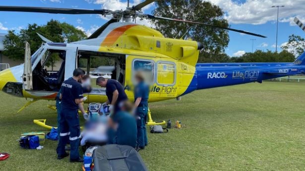 A man has been flown to hospital with "significant" head injuries after a wooden beam reportedly fell on him at Cooroy. Photo: RACQ LifeFlight Rescue