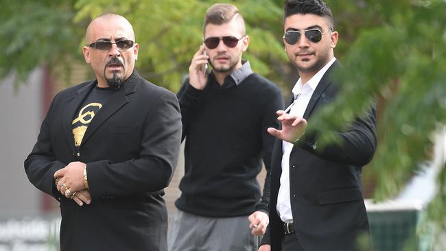 Mourners arrive for the funeral for underworld lawyer Joe Acquaro. Picture: Jake Nowakowski