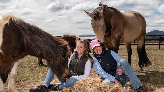 Terri Clements (left) has experienced many benefits from equine assisted learning. She is pictured with You Yangs Equine owner Fiona Bennett. Picture: Brad Fleet