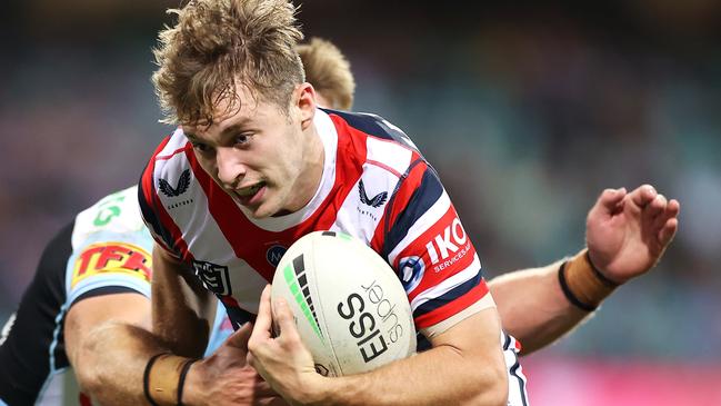 SYDNEY, AUSTRALIA - APRIL 10:  Sam Walker of the Roosters breaks the tackle as he scores a try during the round five NRL match between the Sydney Roosters and the Cronulla Sharks at Sydney Cricket Ground, on April 10, 2021, in Sydney, Australia. (Photo by Mark Kolbe/Getty Images)