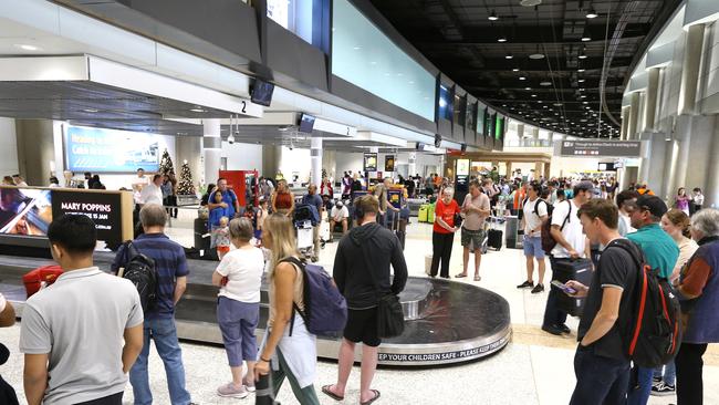 Brisbane Domestic Airport is expected to have a rush. Picture David Clark