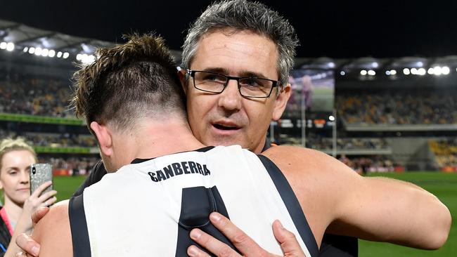 GWS coach Leon Cameron embraces Toby Greene after the siren.