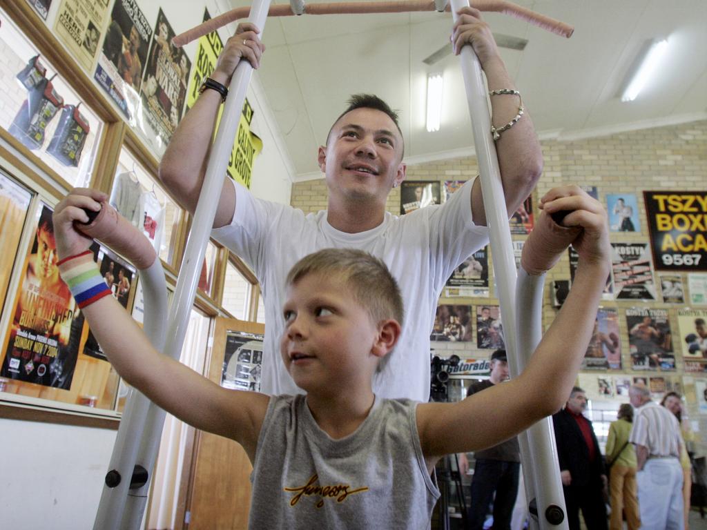 A six-year-old Nikita Tszyu with his dad at Kostya’s gym in 2005. Nikita and Tim now train at the same gym. Picture: Chris/Hyde