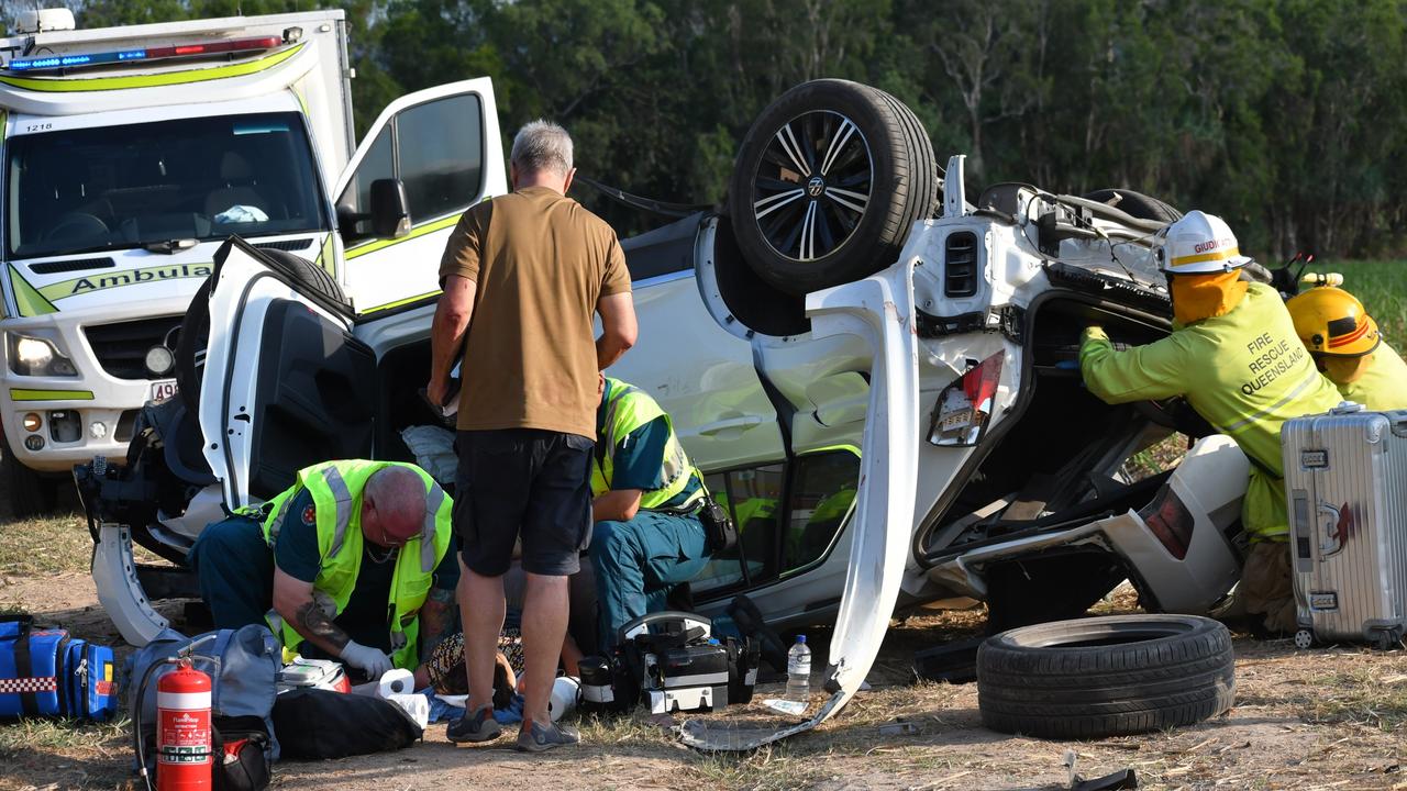 Emergency services respond to a single-vehicle accident on the Bruce Highway between Ingham and Townsville. Picture: Cameron Bates