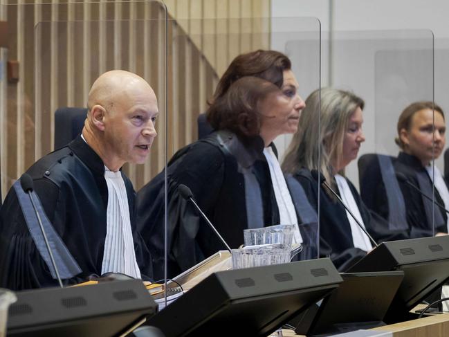 Presiding judge Hendrik Steenhuis (L) opens the court during the third session of the sampling process surrounding the downing of flight MH17. Picture: AFP/Netherlands OUT