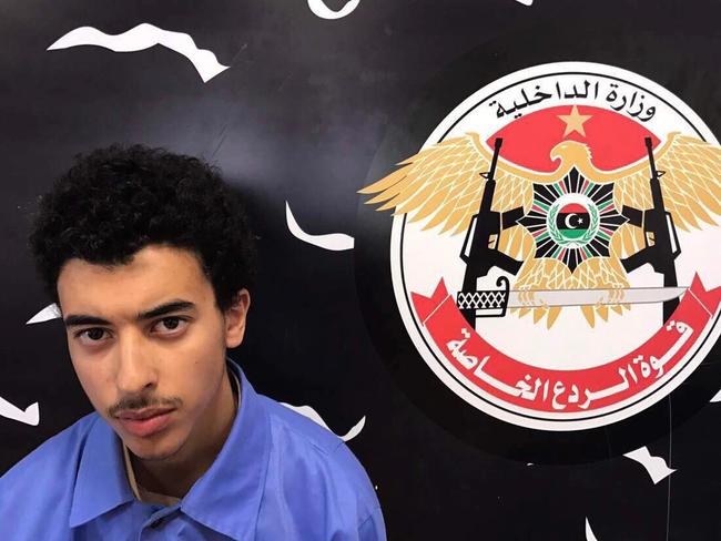 The 18-year-old at the Tripoli-based Special Deterrent anti-terrorism force unit after his arrest on Tuesday. Picture: Ahmed Bin Salman, Special Deterrent Force via AP