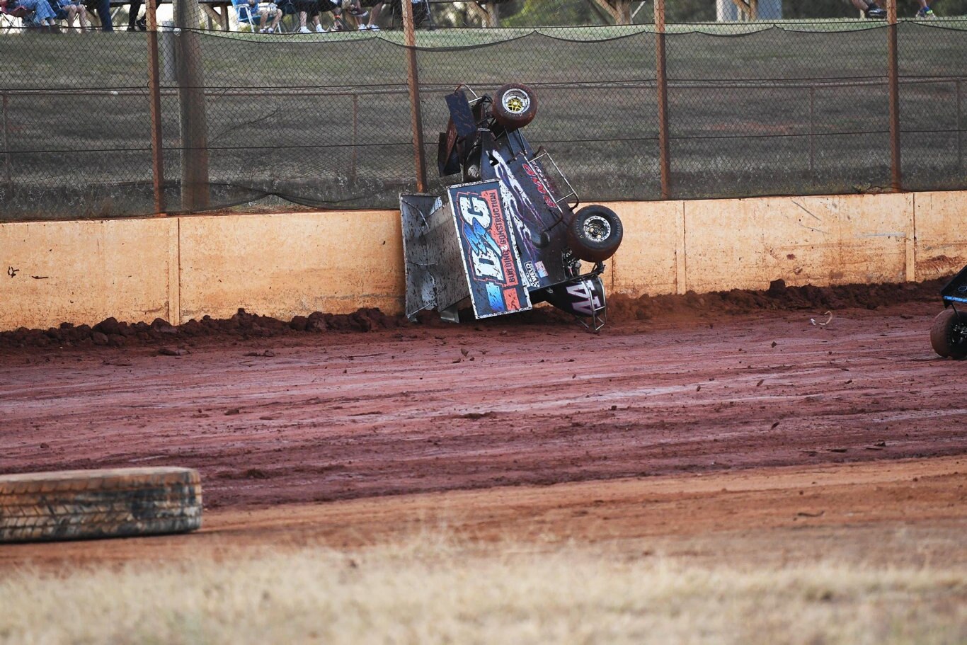 Maryborough Speedway Round One - Ken Newton climbs the wall after losing control on the slippery track. Picture: Cody Fox