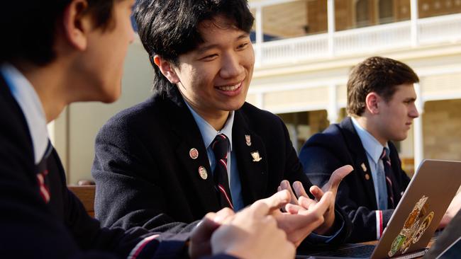 Cranbrook students in front of the school's boarding house.