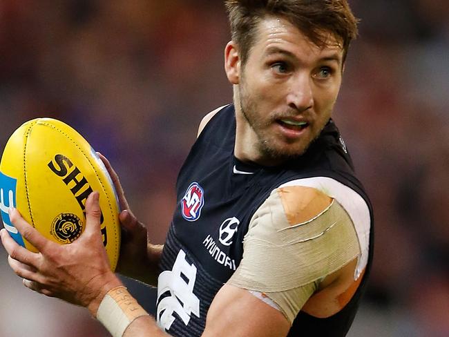 MELBOURNE, AUSTRALIA - MAY 1: Dale Thomas of the Blues in action during the 2016 AFL Round 06 match between the Carlton Blues and the Essendon Bombers at the Melbourne Cricket Ground, Melbourne on May 1, 2016. (Photo by Adam Trafford/AFL Media/Getty Images)