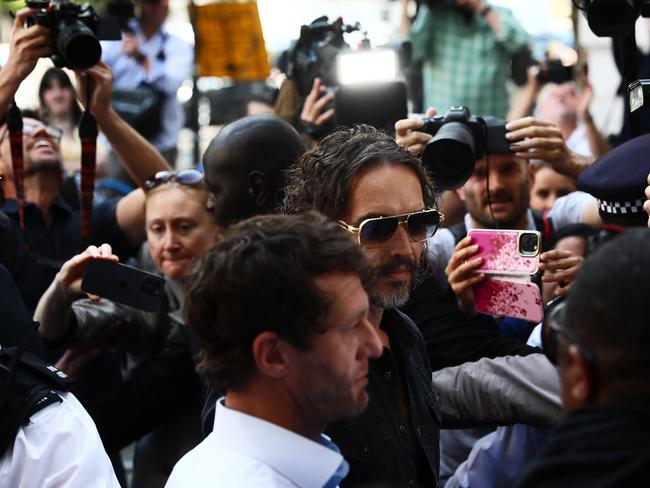 Russell Brand arrives at Westminster Magistrates’ Court on May 2 in London where he faces charges related to accusations of rape, indecent assault and sexual assault between 1999 and 2005. Picture: Getty Images