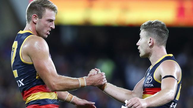 Crows defensive linchpins Daniel Talia and Rory Laird on the final siren after the Richmond win. Picture SARAH REED