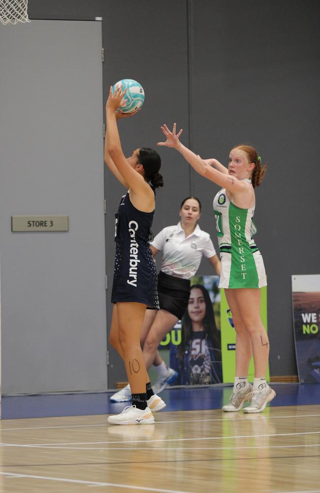 QISSN 2024 division one grand final - Canterbury College v Somerset College. Pictured: Penelope Deacon defends Harmony O'Brien