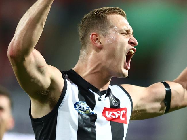 GOLD COAST, AUSTRALIA - JUNE 29: Nathan Kreuger of the Magpies celebrates a goal during the round 16 AFL match between Gold Coast Suns and Collingwood Magpies at People First Stadium, on June 29, 2024, in Gold Coast, Australia. (Photo by Chris Hyde/Getty Images)