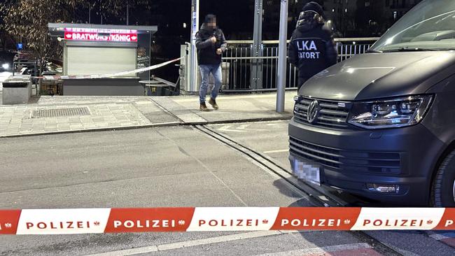 Austrian police are seen near a police cordon after a knife attack near the main square in the city centre of Villach, southern Austria on February 15, 2025. Picture: AFP