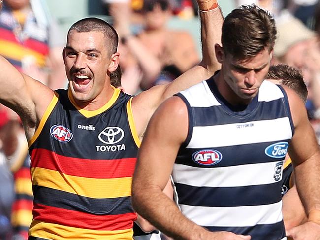 ADELAIDE, AUSTRALIA - MARCH 20: Taylor Walker of the Crows celebrates another goal during the 2021 AFL Round 01 match between the Adelaide Crows and the Geelong Cats at Adelaide Oval on March 20, 2021 in Adelaide, Australia. (Photo by Sarah Reed/AFL Photos via Getty Images)